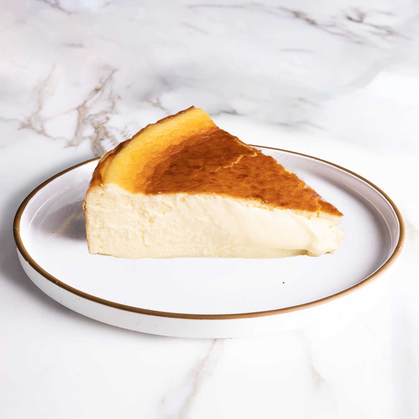 A slice of Chèvre Classic Burnt Basque Cheesecake